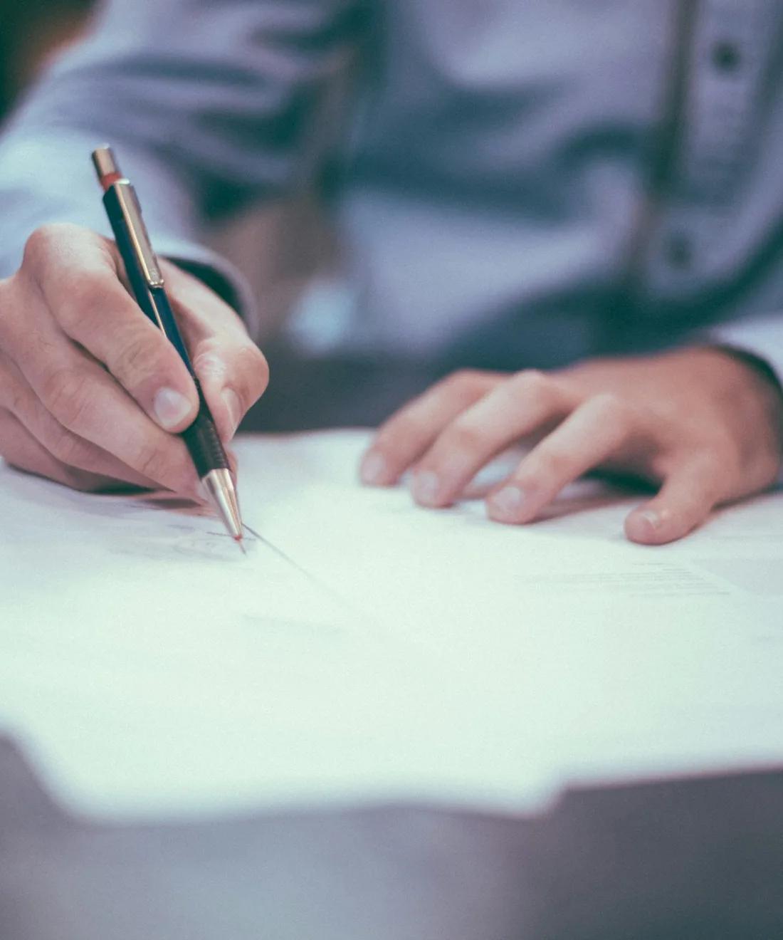 Insurance underwriter reviewing a policy document